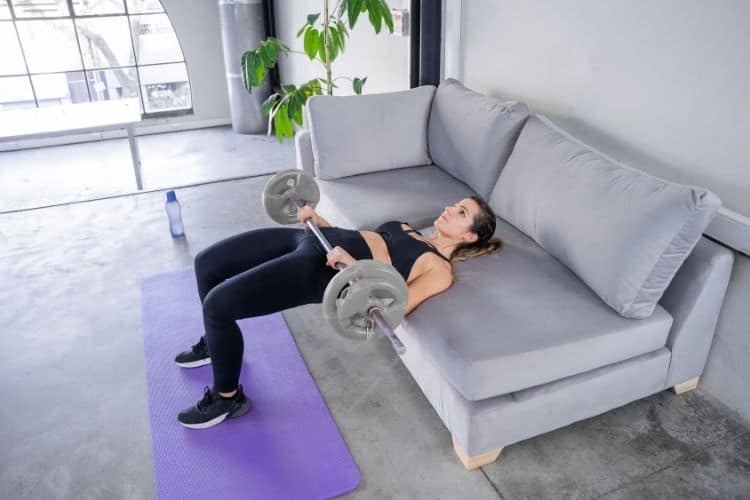 Woman performing Glute Isolation Workouts at Home